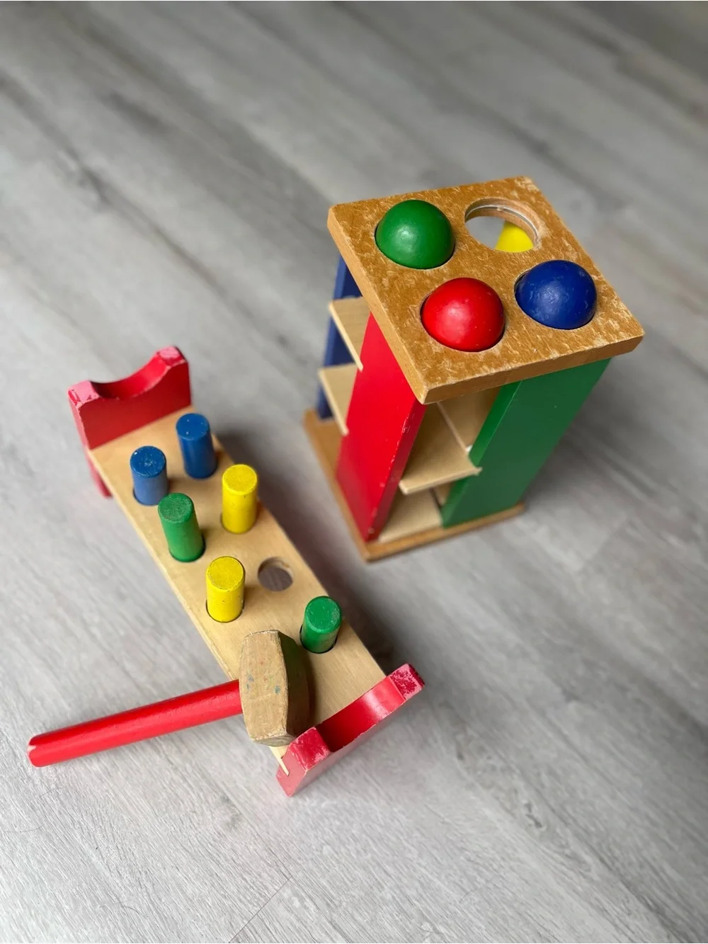 Melissa & Doug Wooden Pound-and-Play Bench in Red, Green, Blue, Yellow